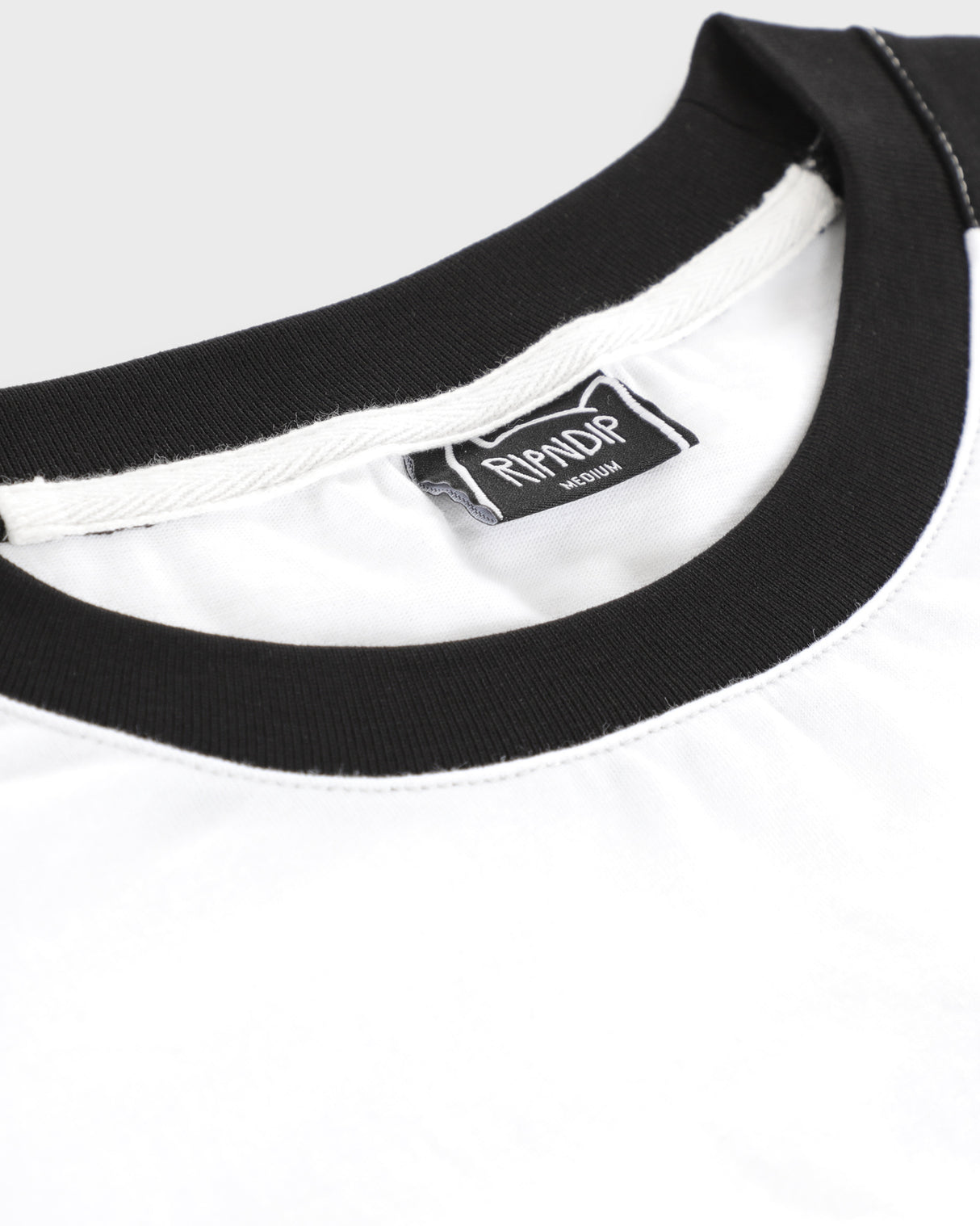 LAKAI x RIPNDIP - Raglan SS Tee - White Black
