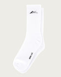 White sock with black logo and text on a beige background