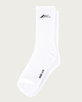 White sock with black logo and text on a beige background